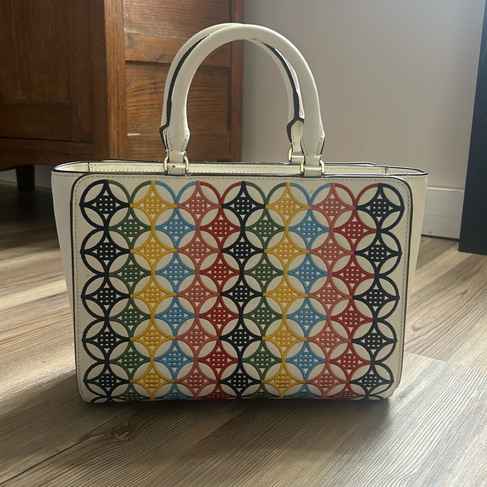 I purchased this adorable bag, removed the tags but then never used it.